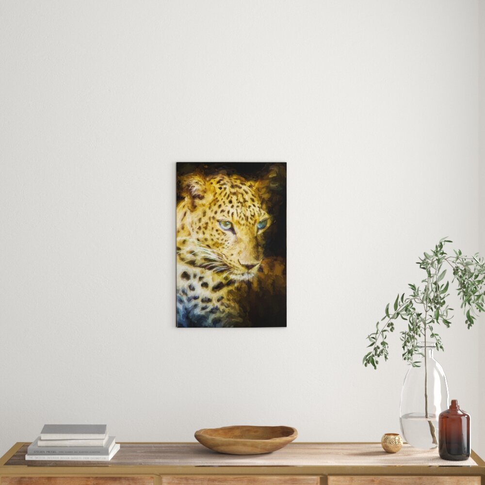 Leinwandbild Leopard mit blauen Augen in Braun