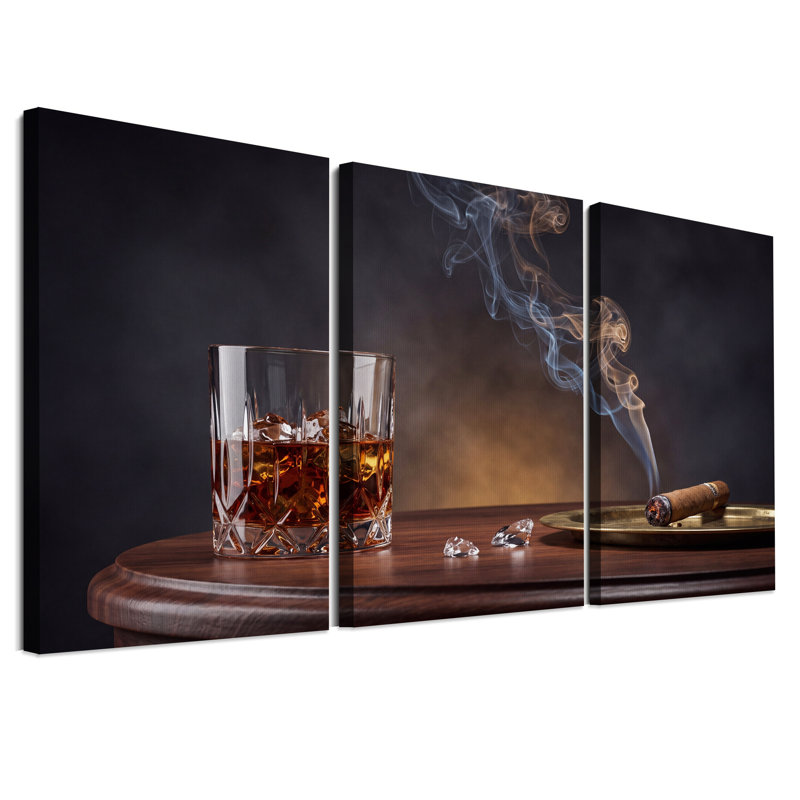Ensemble de 3 tableaux sur toile représentant un verre à whisky et un cigare fumant sur une table en bois.
