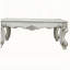 Table basse en perle antique avec pieds en volute