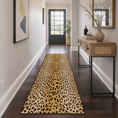 Tapis noir / orange / jaune à imprimé léopard avec envers antidérapant Sylvan