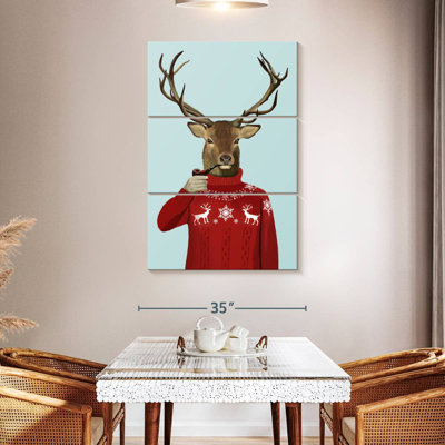 Cerf dans un chandail de ski Brampt