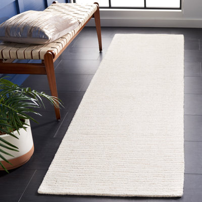 Tapis ivoire / beige en laine touffeté à la main Armina