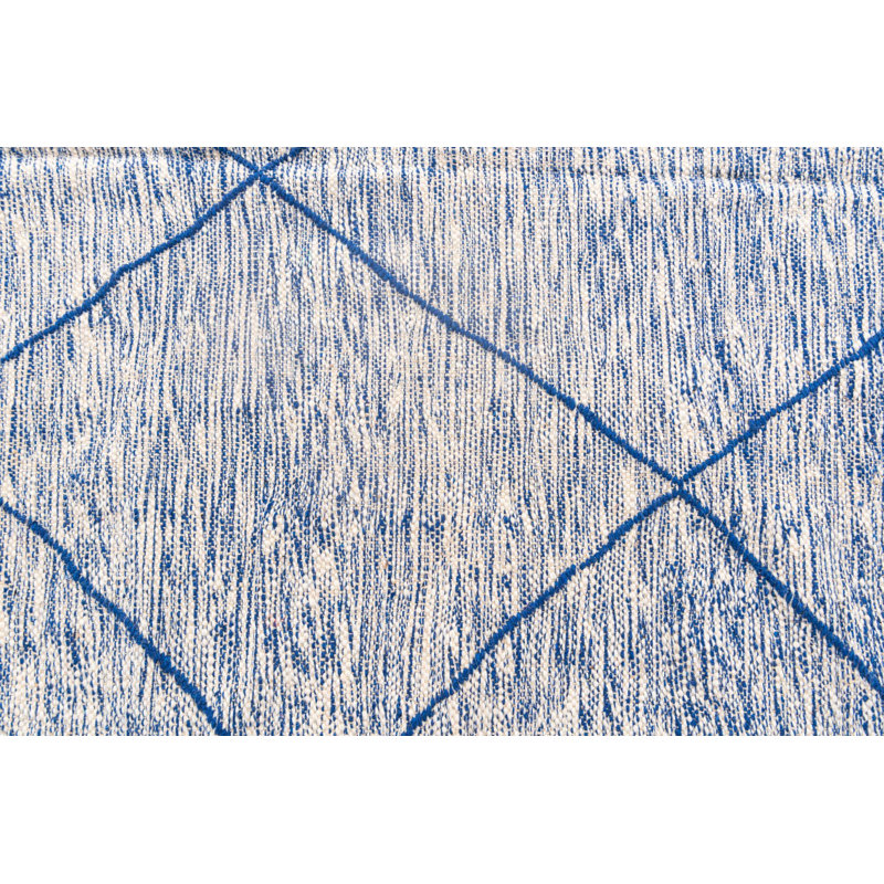 Tapis bleu Kalmanovitz