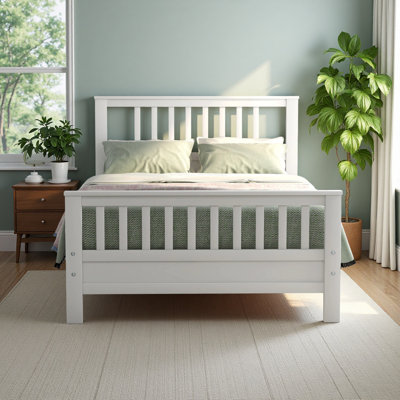Lit plateforme en bois avec tête et pied de lit