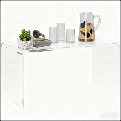 La table basse élégante à cascade rectangulaire de 32 pouces de long, parfaite pour les intérieurs modernes et minimalistes, rehausse l'ouverture et la luminosité.