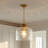 Baltic 1-Light Brushed Gold Mini Pendant Light