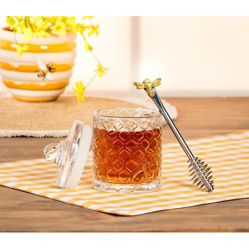 Motif en nid d'abeille avec abeille sur pot à couvercle scellé