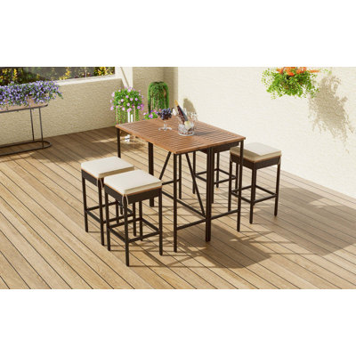 5-Piece Outdoor Acacia Wood Bar Height Table And Four Stools With Cushions, Garden PE Rattan Wicker Dining Table, Foldable Tabletop, High-Dining Bistro Set, All-Weather Patio Furniture