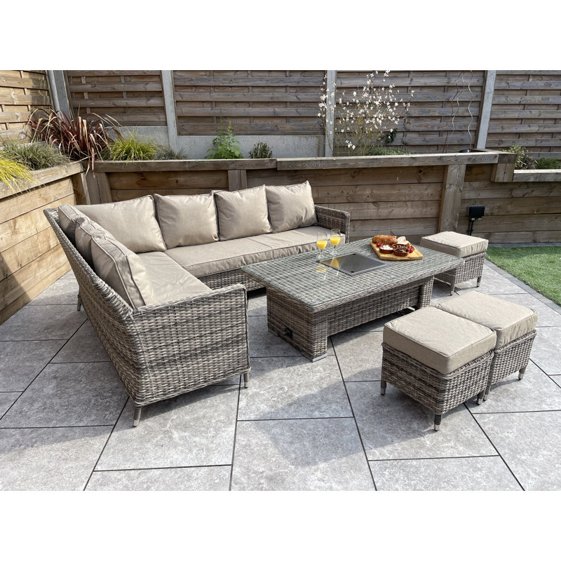 Angustain 9 - Person Wicker Patio Dining Set with Rectangular Table , Cushions Included