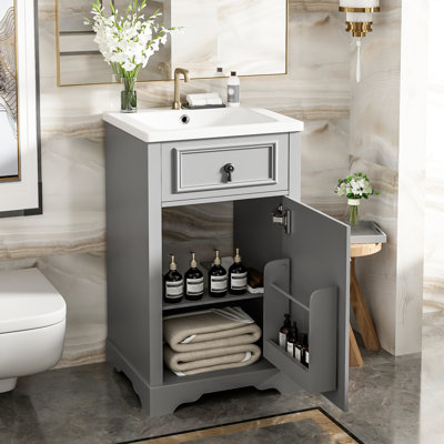 Meuble-lavabo de 50 cm avec lavabo en céramique, porte à fermeture douce et agencement de rangement intelligent pour les petits espaces. Étagère ajustable pour une longue durée de vie.