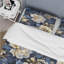 Literie de marguerites bleu foncé et blanches-609622914
