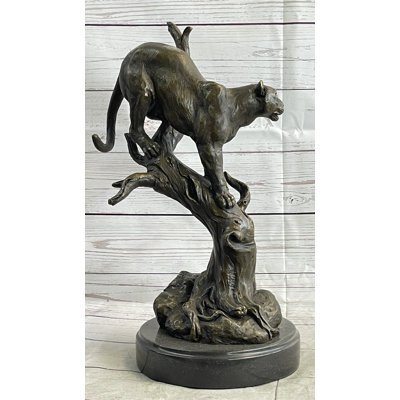 Grande sculpture de lion de montagne africain Makela