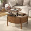 Table basse moderne en noyer de style campagnard, table basse ronde à plateau relevable avec compartiment de rangement dissimulé, table d'appoint centrale circulaire en bois massif cannelé pour les espaces de salon