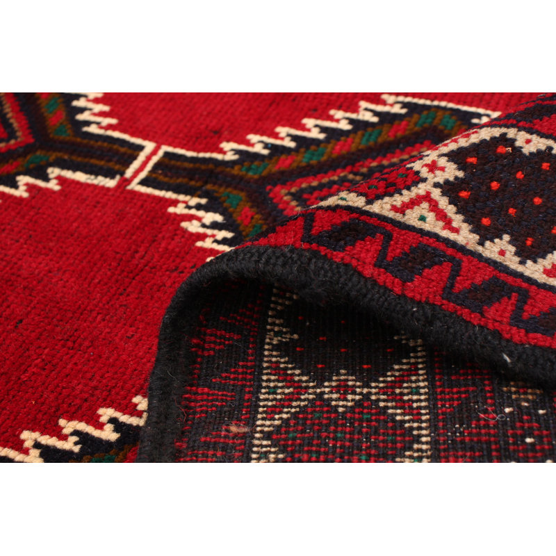 Tapis rouge en laine noué à la main