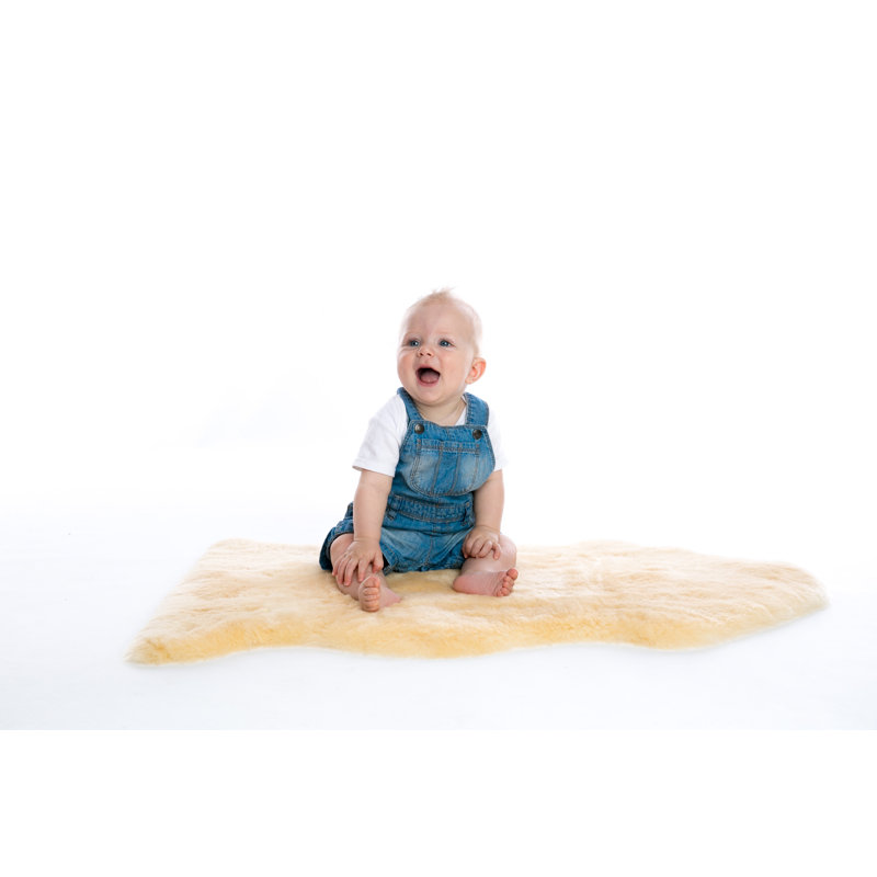 Tapis bébé en peau de mouton et laine courte