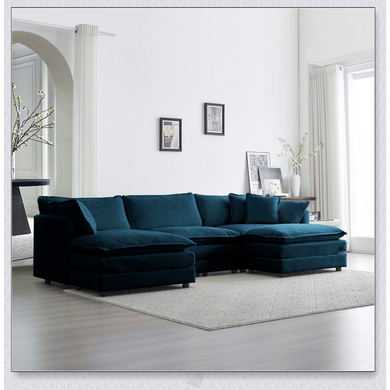 Canapé confortable avec coussins moelleux et structure durable, parfait pour les espaces de vie modernes et traditionnels