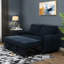 Lit bleu marine confortable avec compartiment de rangement et dossier pratique