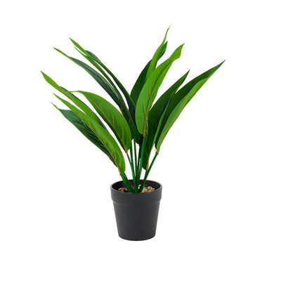 Plante artificielle verte en pot avec de larges feuilles