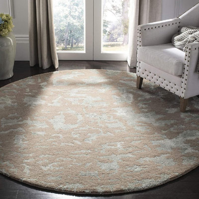 Tapis taupe en laine / coton / viscose touffeté à la main Jorie