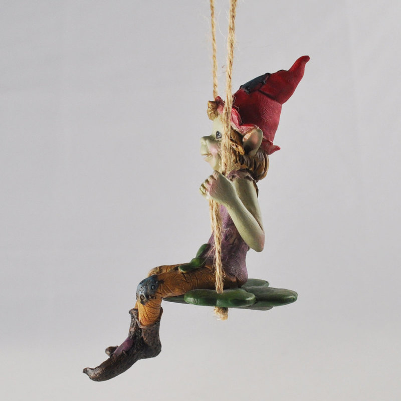 Eudora Pixie Hanging On A Clover Swing