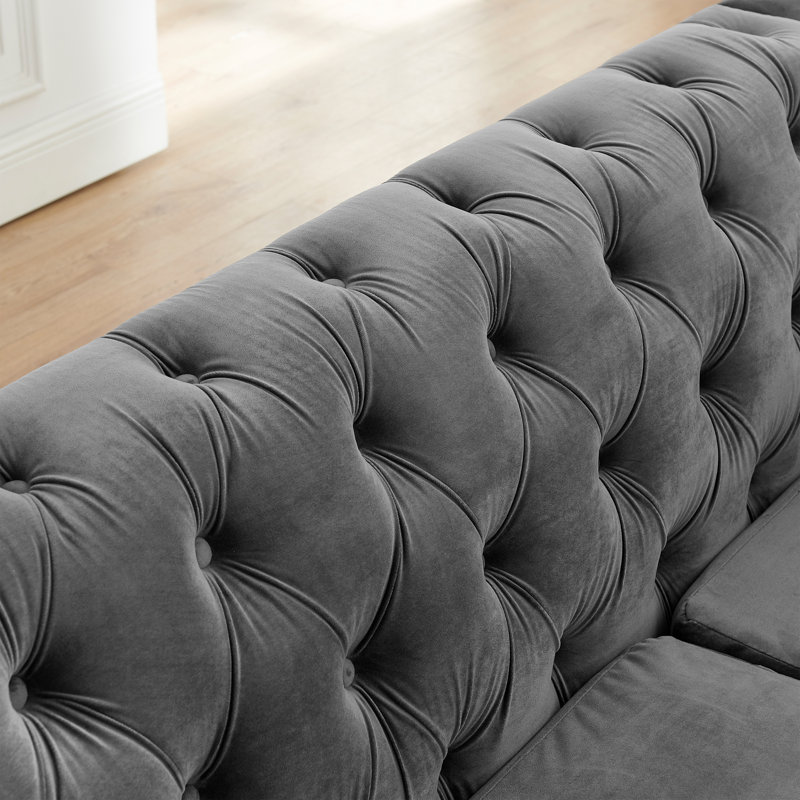 Canapé Chesterfield luxueux en velours doré satiné de luxe pour les salons élégants