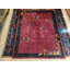 Tapis décoratif antique à motif floral de couleur mauve antique