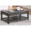 Table basse à plateau relevable gris
