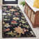 Hollander Floral Handmade Looped/Hooked Wool Black Area Rug