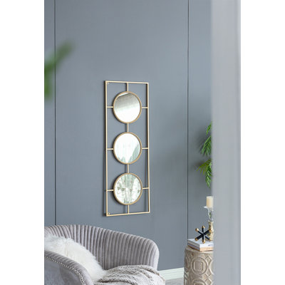Miroir mural 3 pièces dans un cadre rectangulaire doré
