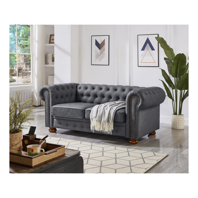 Causeuse de canapé classique en similicuir Chesterfield