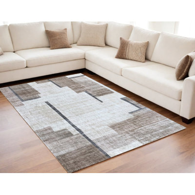Tapis abstrait beige et brun 5 pi x 8 pi