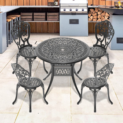 Black Cast Aluminum 5 Dining Furniture . Exquisite Lines. 100% Aluminum, Built To Last. , , And -. Ergonomic Seating For Optimal Relaxation. Slip Noise-reducing Foot Pad. Simple Assembly. Seats 4.