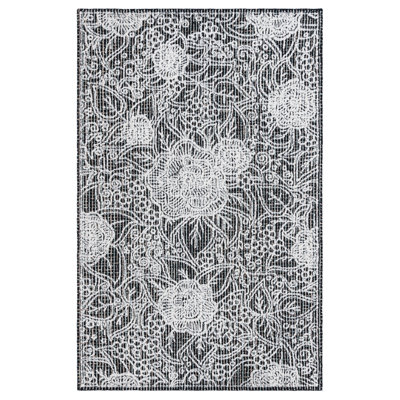 Chrishaunda Hand Tufted Wool Cotton Pet Floral Rug in Black/Ivory