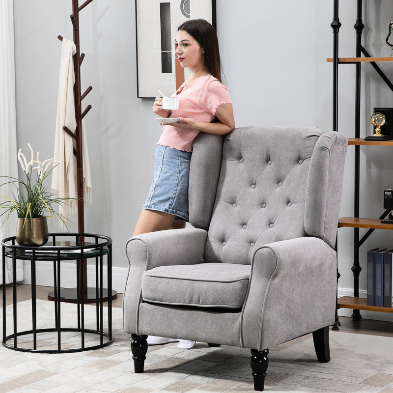 Fauteuil d'appoint à boutons gris avec dossier à oreilles haut, coussin de siège épais et arrondi pour la chambre à coucher