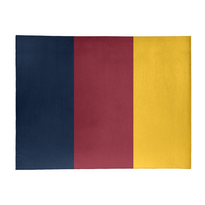 Tapis bleu/jaune/rouge rayé