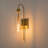 Dimmable Armed Wall Sconce with Clear Glass Shade