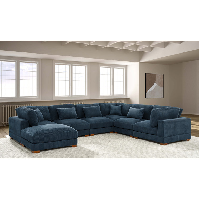 Arliz 7 - Piece 144" Wide Reversible Modular Corner Sectional with Ottoman