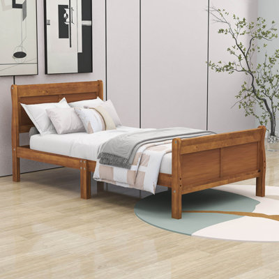 Base de lit plateforme en bois avec tête de lit Dovidio
