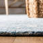 Tapis en laine / coton bleu clair / ivoire touffeté à la main Angleside-781283101