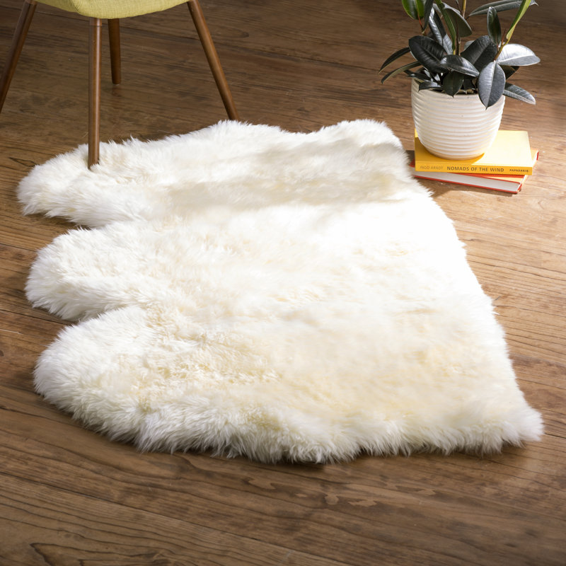 Keira Solid Colour Sheepskin Hand Woven Area Rug, Rectangle 91cm x 152 cm