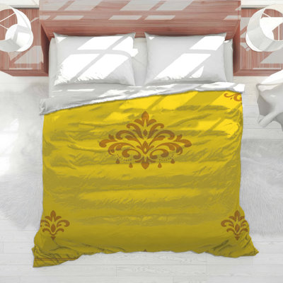 Édredon jaune à motif damassé