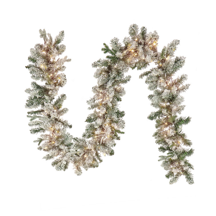 The Holiday Aisle® 9 ft. Iceland Fir Garland with Dual Color LED Cosmic Lights