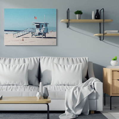 " Blue Lifeguard Stand At Coastline American Flag "