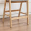 Tabouret de comptoir rembourré Devane-257417113