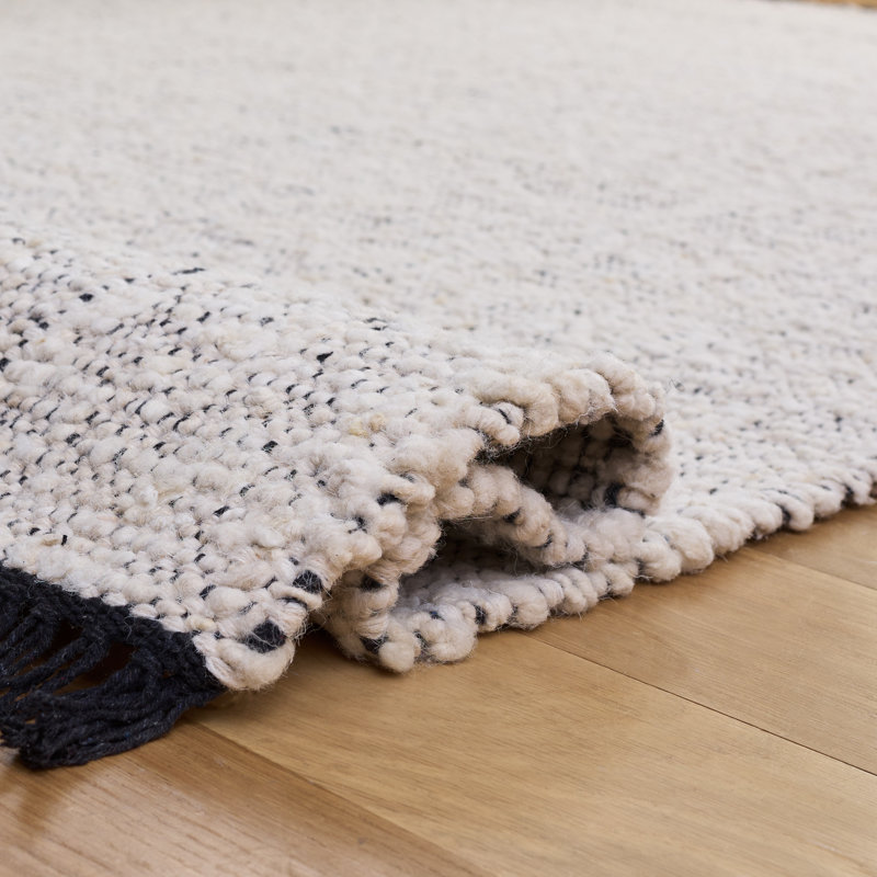 Manhattan Hand Woven Wool/Cotton Solid Color Rug in Ivory/Black, Rectangle 5' x 8'