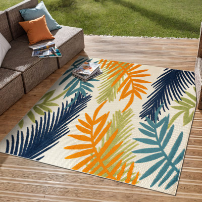 Tapis intérieur / extérieur Parksley Palm Frond - ivoire / orange / bleu marine