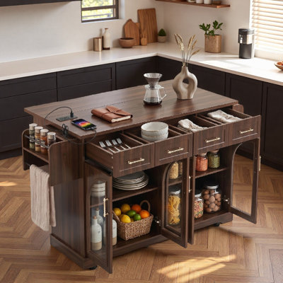 Îlot de cuisine moderne avec armoires de rangement, tiroirs, porte-épices, porte-serviettes, station de charge intégrée, portes en verre arquées, abattant et roulettes