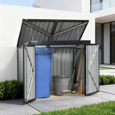 La poubelle en métal pour l'extérieur peut contenir 2 poubelles avec porte verrouillable et toit incliné pour la protection contre les intempéries.