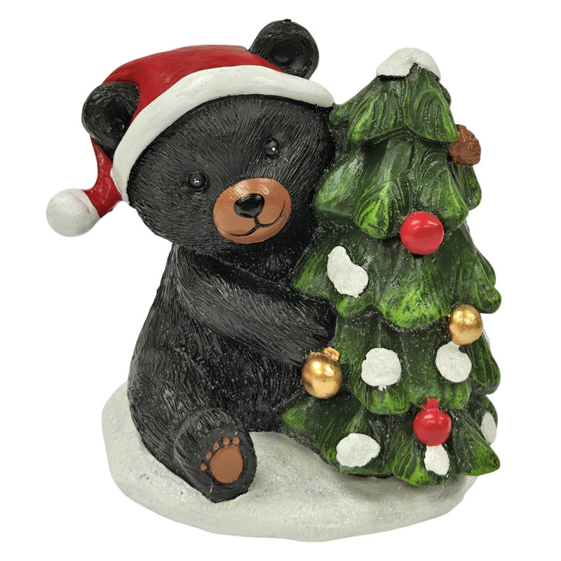 BEAR WITH HAT BY CHRISTMAS TREE