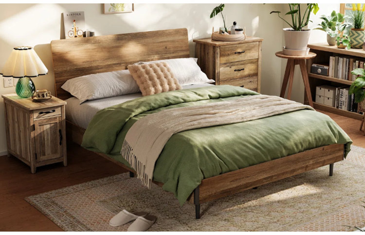 bedroom with wood bed frame, matching nightstands, and mixed wood tones styled with green bedding and neutral decor